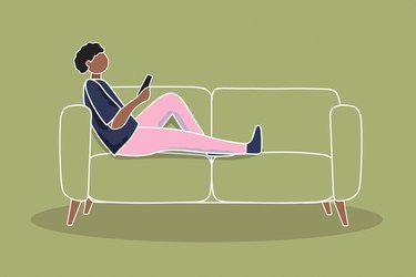 Illustration of someone sitting on a couch in sweaty workout clothes scrolling on a smartphone