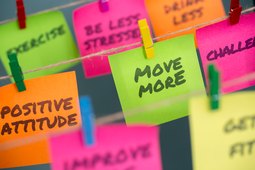 Colorful Post-It notes featuring positive weight-loss tips
