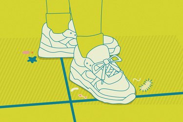 Person wearing sneakers on a tiled floor, with illustrations of germs